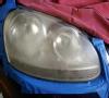 Headlight before having work done.
